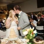 Bride and Groom kissing in affordable up north lakeside venue