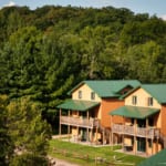 Two tri-level large 4BR family cabins are just yards from the lake and woods
