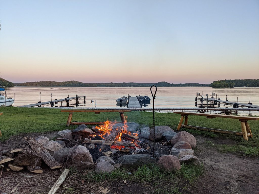 Evening bonfire on at MN lake cabin resort on Fish Trap Lake