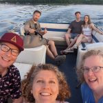 pontoon cruising Fish Trap Lake MN with 7 men and women