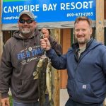 two men show off nice stringer of walleye at Campfire Bay Resort