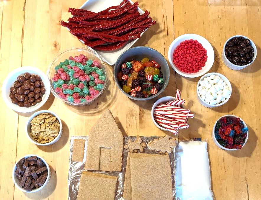 gingerbread pieces and candies on a table