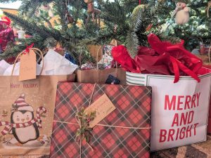 Christmas gifts under a tree at a Minnesota lake resort cabin