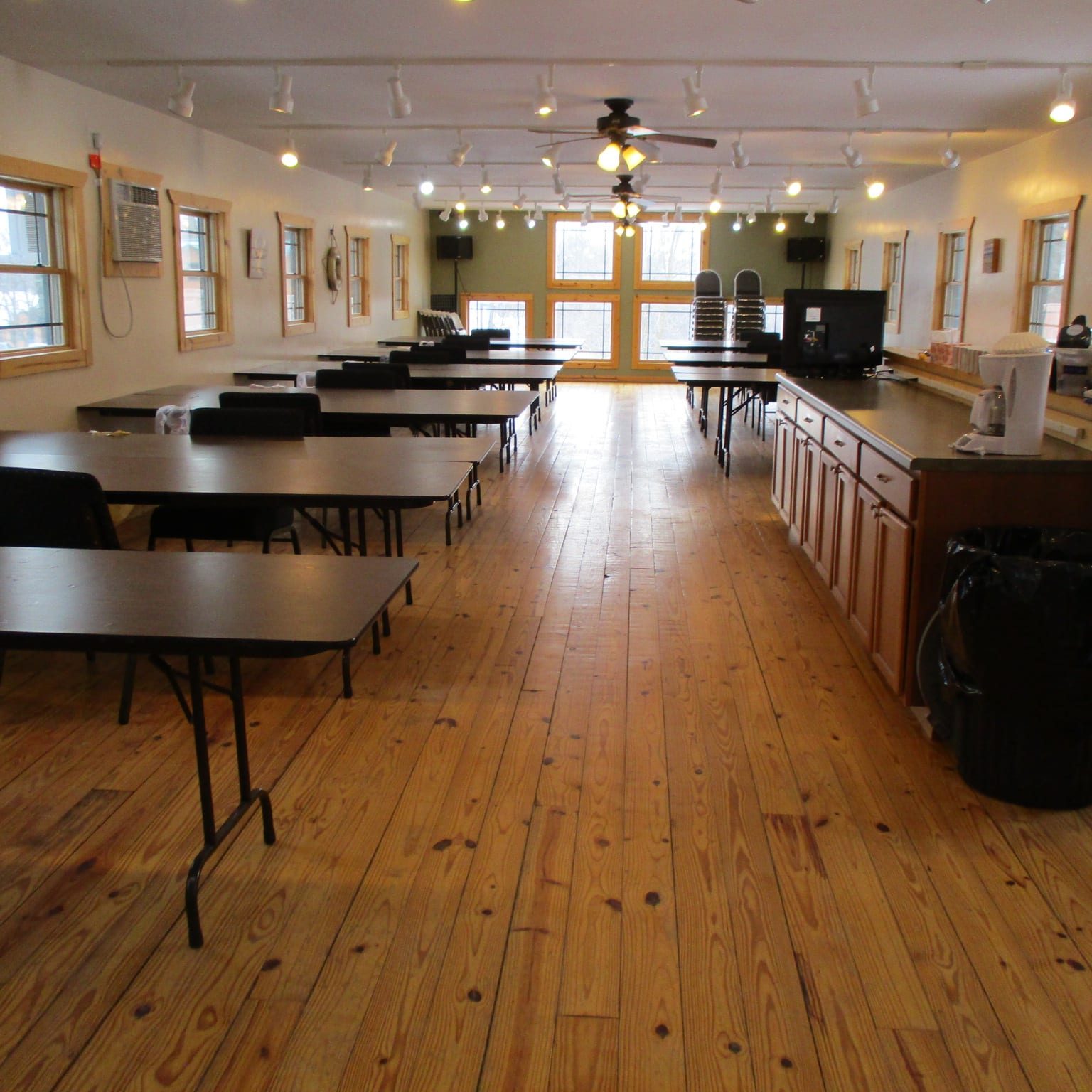 lodge room setup with tables for crafting or conference