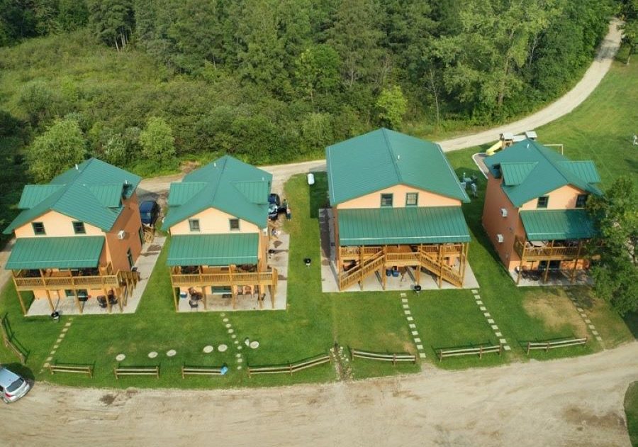 Our 4br large family or reunion cabins are in a row just 150 ft from Fish Trap Lake